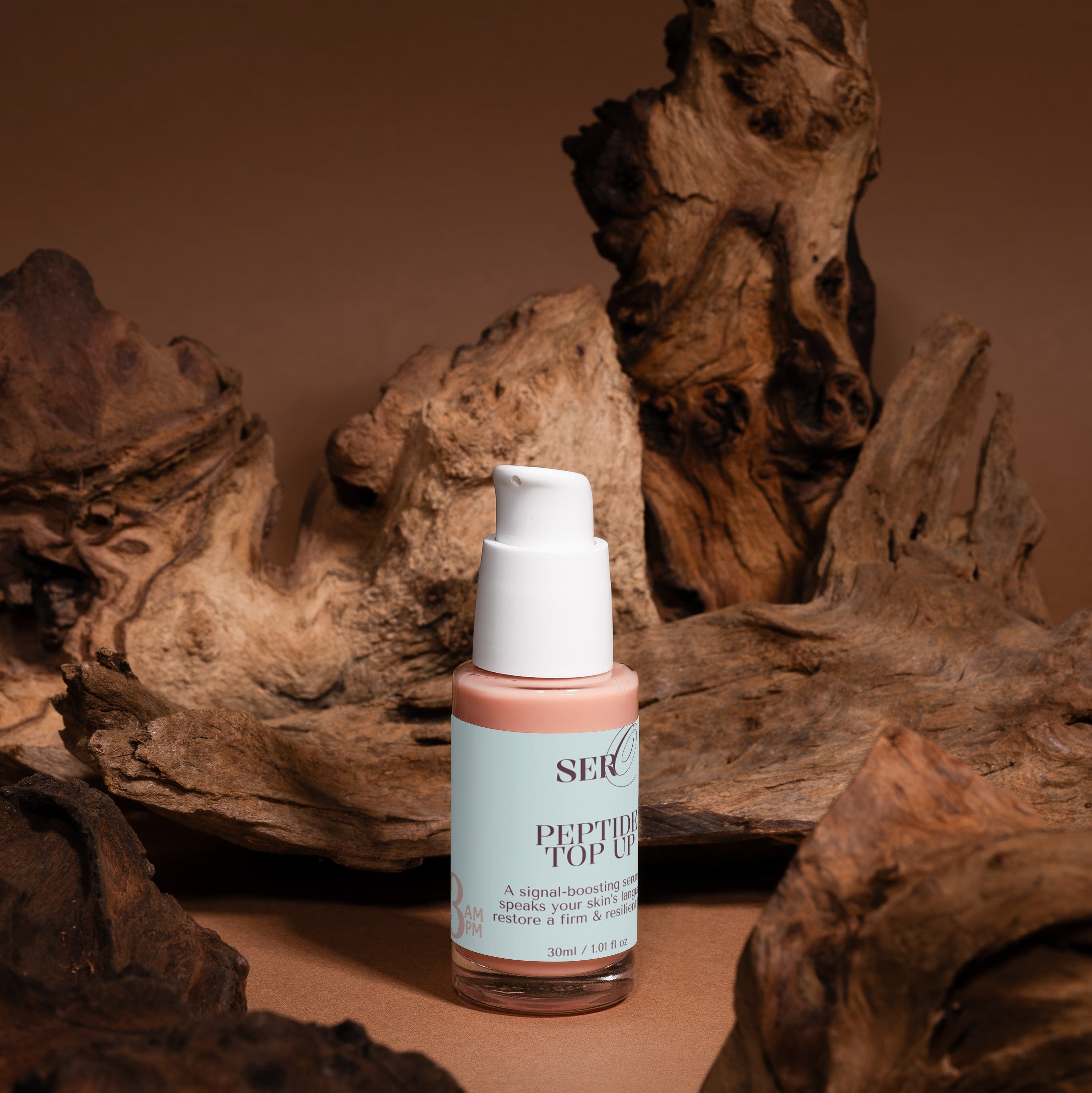 The Peptide Top-Up serum applied to skin — reduces fine lines during perimenopause