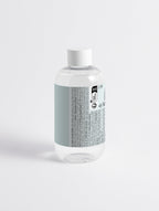 The Go-Between glycolic acid toner applied to skin — targets dark spots and melasma