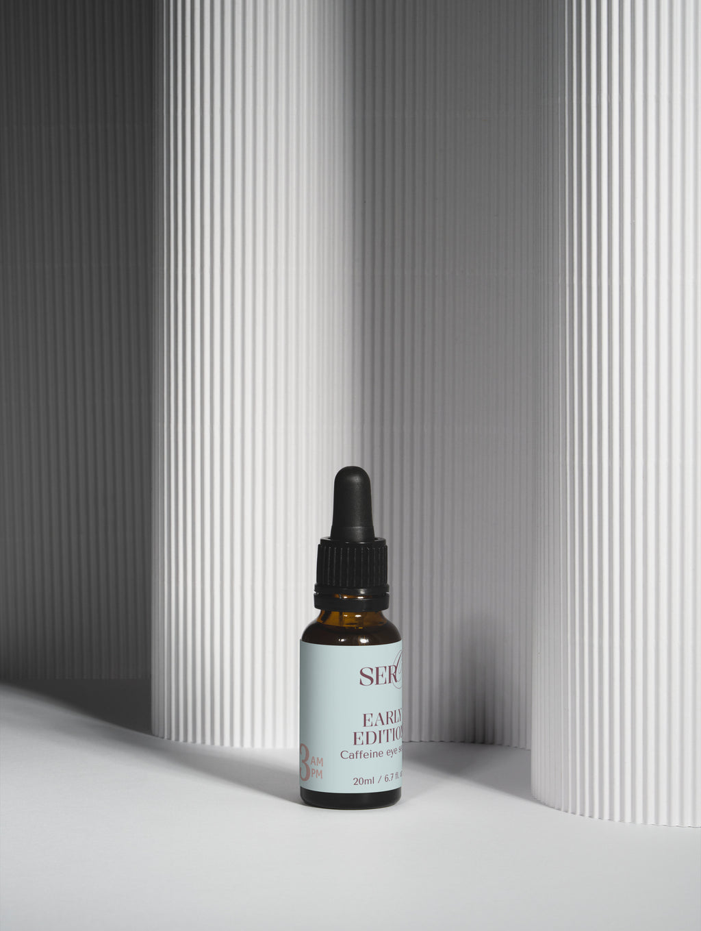 Early Edition caffeine booster full product view in amber packaging