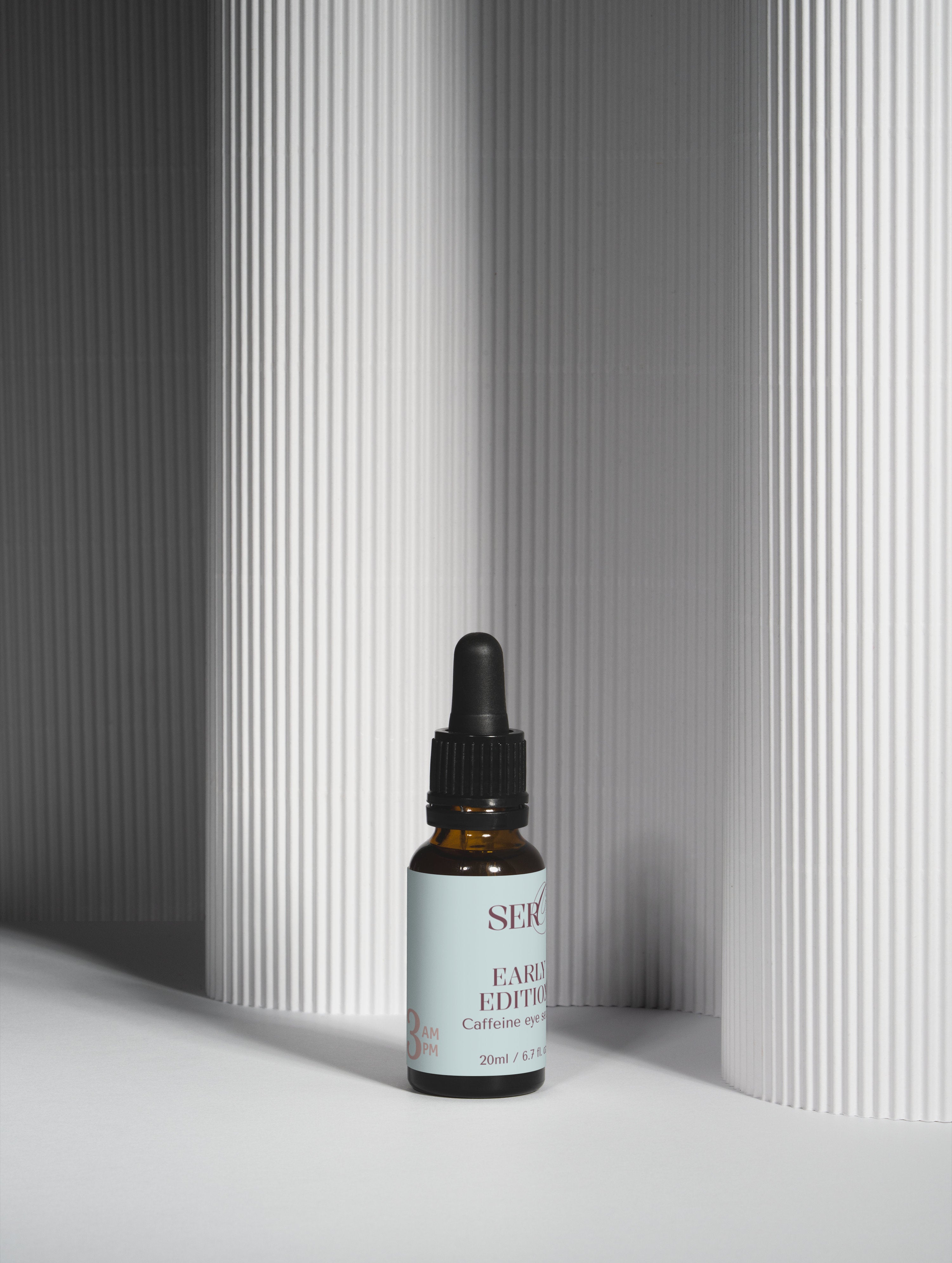 Early Edition caffeine booster full product view in amber packaging