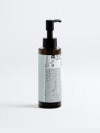 Whole Story body oil applied to skin showing hydration and healthy glow